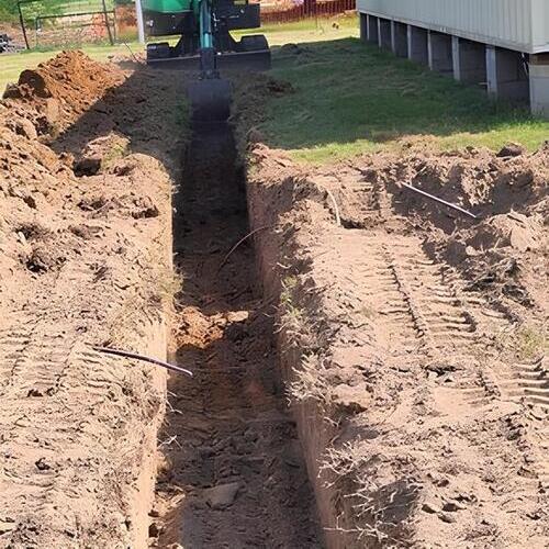 trench in the middle of a yard